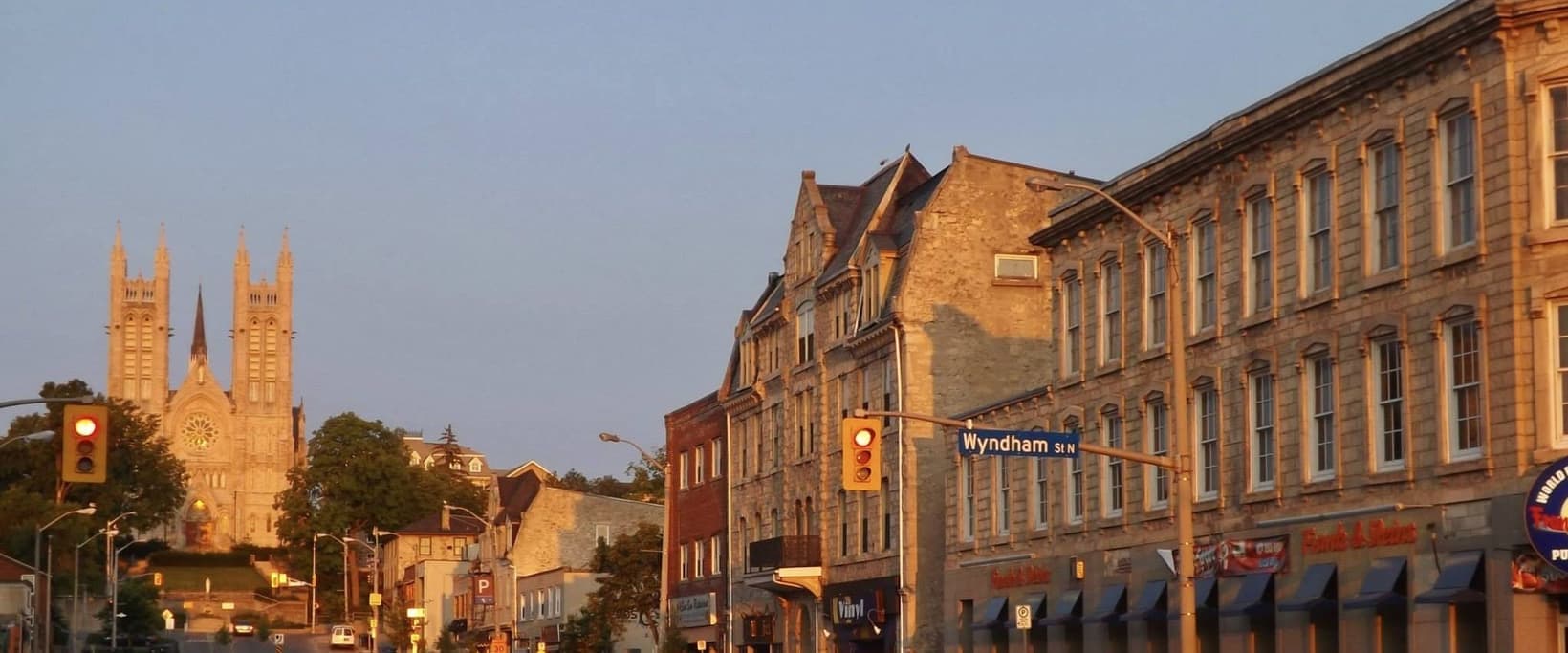 Macdonell Street in evening light, with the Basilica of Our Lady at the top of the hill